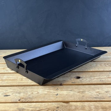 Netherton Foundry Prospector Roasting Tray. Can be used on large suitably sized induction hobs. To keep tray flat, on all heat sources (especially induction), heat up slowly at first, and don&