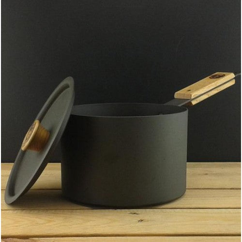 Netherton Foundry Spun Iron Saucepan. Made from durable black iron, it heats evenly, giving a great cooking performance that only gets better with age and use as the seasoned patina develops. Suitable for use on all cooking surfaces and lighter than cast iron, the Saucepan with lid is not only stylish to look at but a joy to use. 