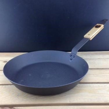 Netherton Foundry Spun Iron Frying Pan 10". Made from spun iron the Frying Pans are durable with excellent heat retention properties, making them perfect for high-heat searing. Lighter to hold than a cast iron frying pan they are suitable for use on all cooking surfaces, including induction.